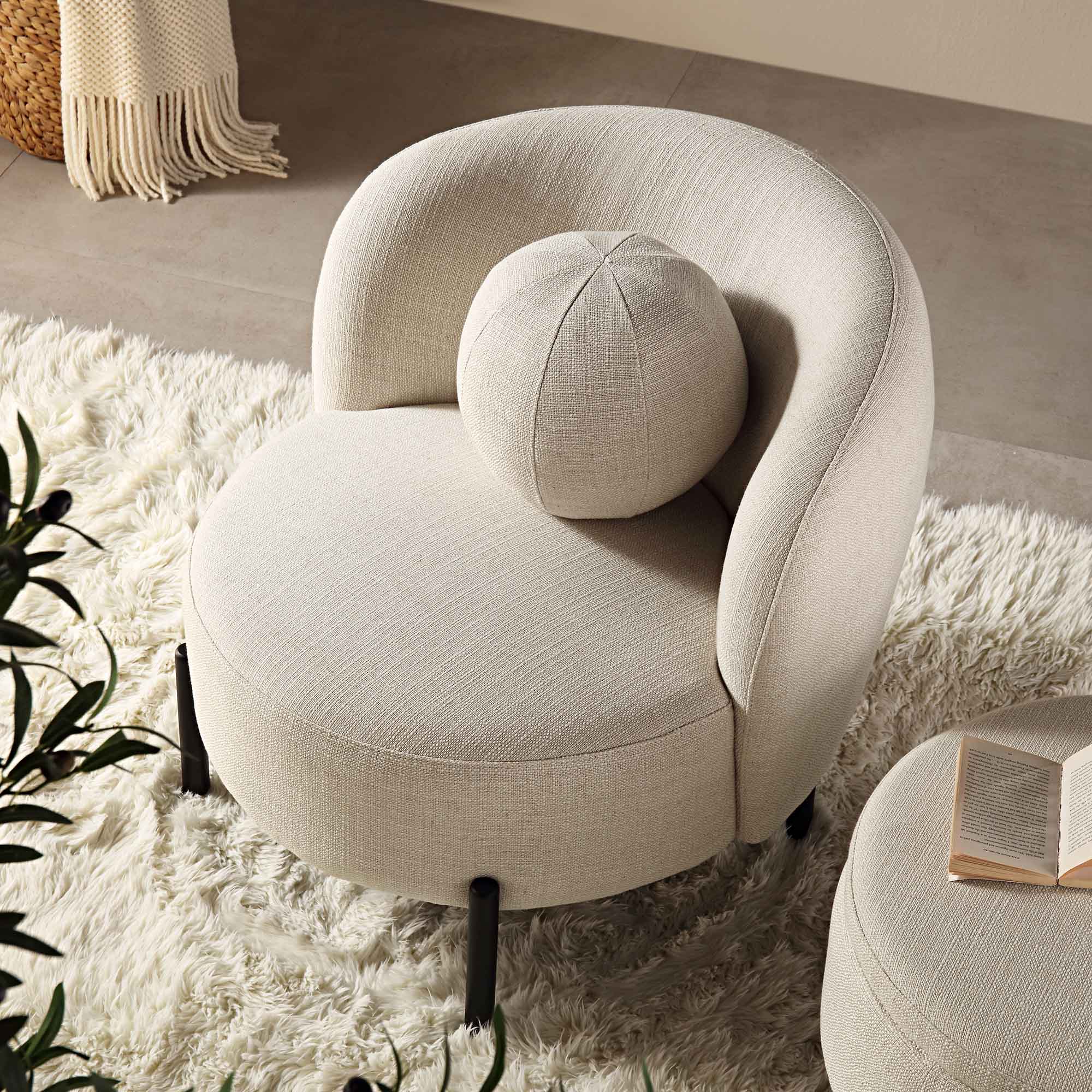 Beige linen-blend armchair with spherical seat, curved design, 31.5 inches wide, suitable for living room use.