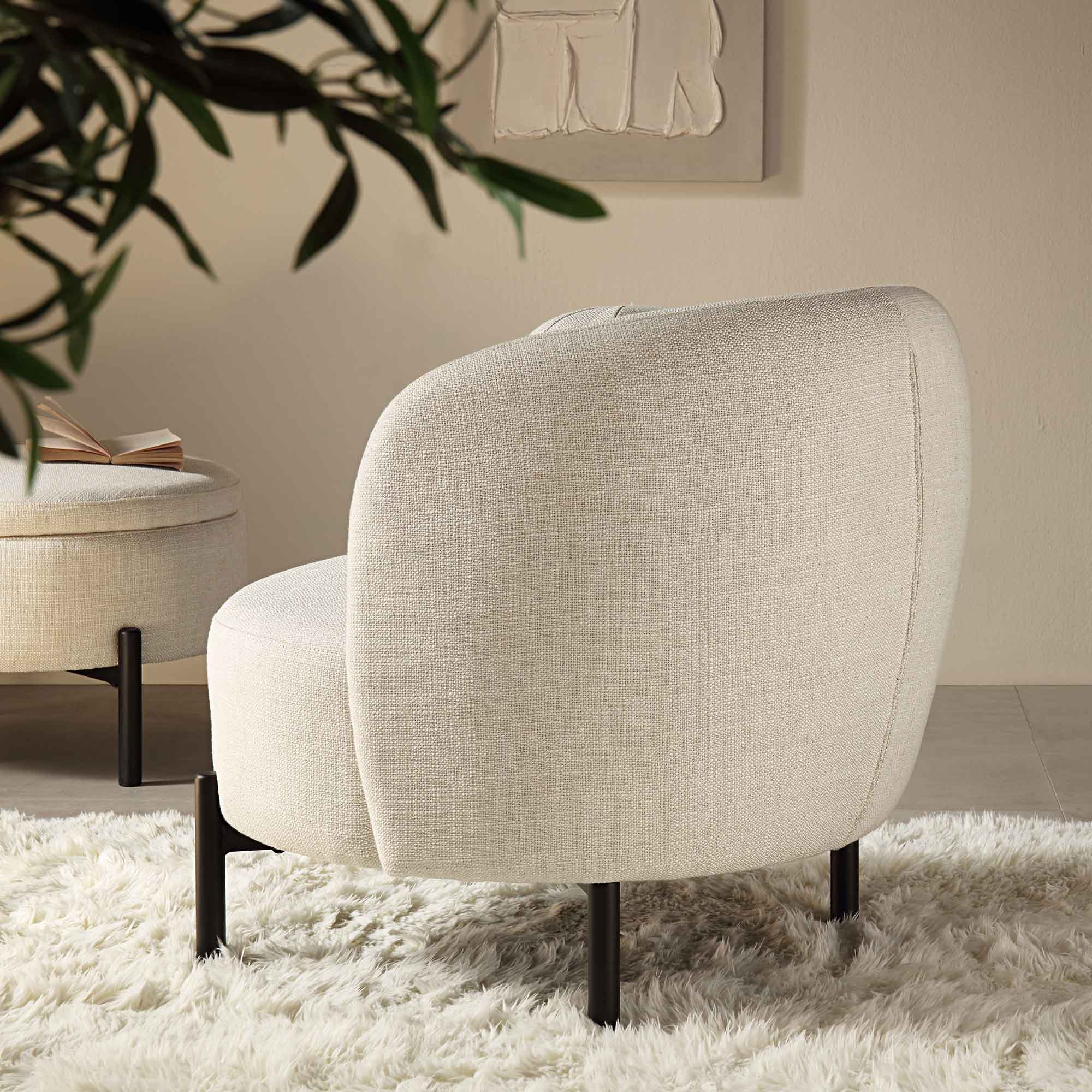 Beige linen-blend armchair with spherical seat, curved design, 31.5 inches wide, suitable for living room use.
